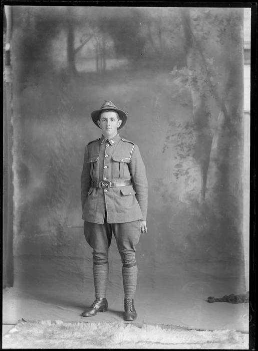 Studio portrait of unidentified soldier, in uniform, probably Christchurch district