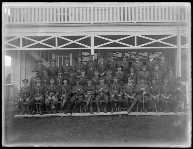 A group of unidentified officers in front of the [barracks], at casual camp, Hastings