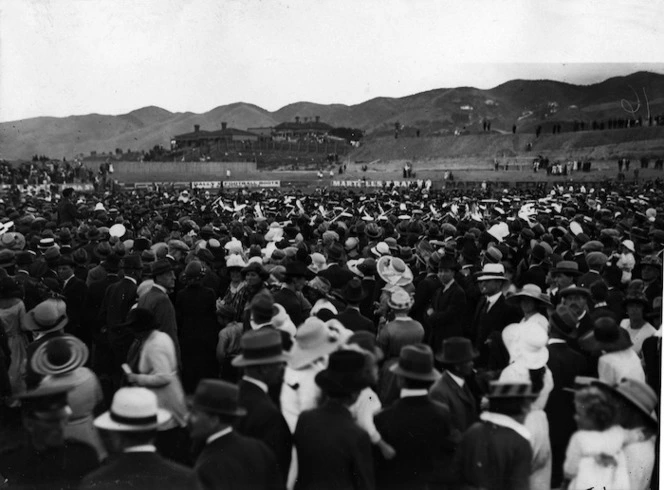 Crowd, including a brass band, at Athletic Park in Wellington