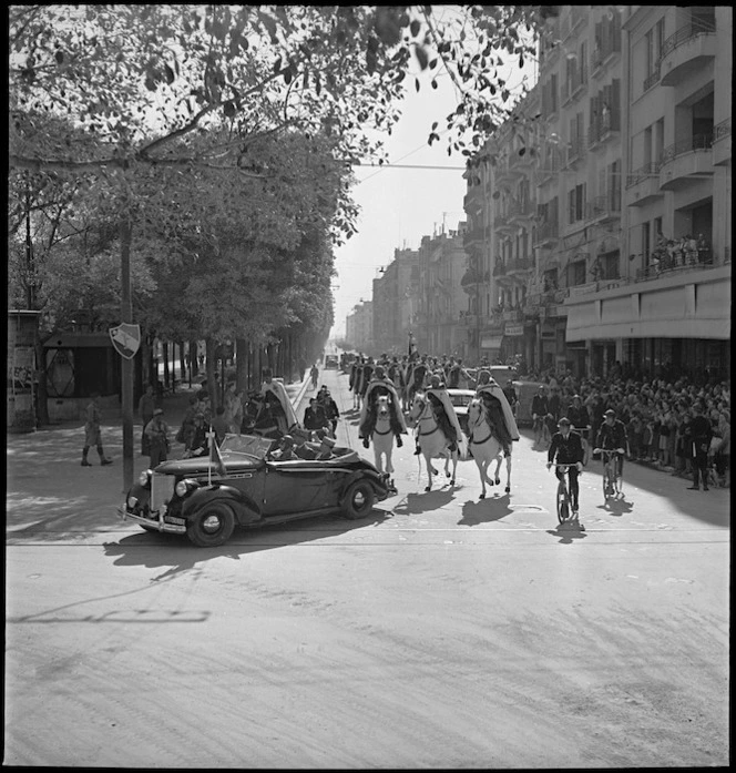 Spahis preceded by car carrying General Giraud during triumphal parade in Tunis, World War II - Photograph taken by M D Elias