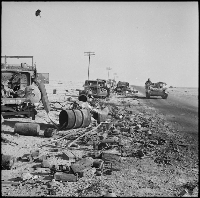 Enemy transport wrecked during Axis retreat along North African Coast - Photograph taken by H Paton