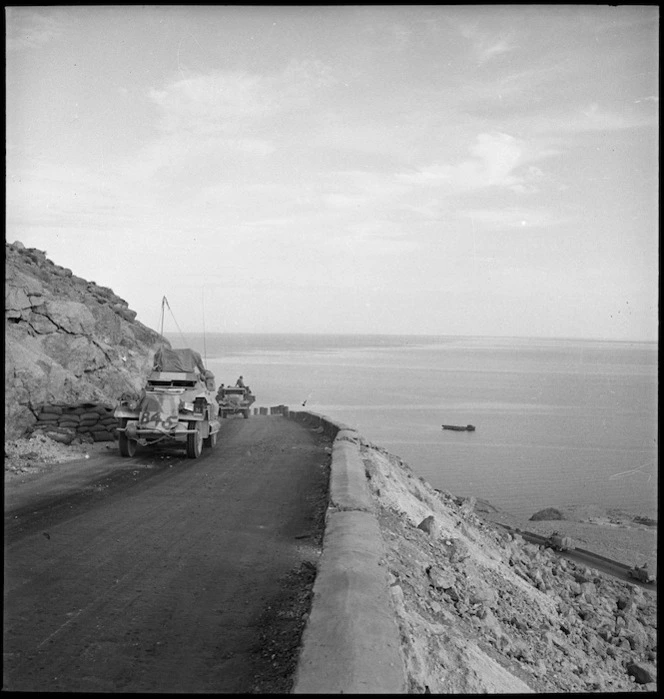 British armoured car leads convoy climbing Sollum Pass Road, Egypt - Photograph taken by M D Elias