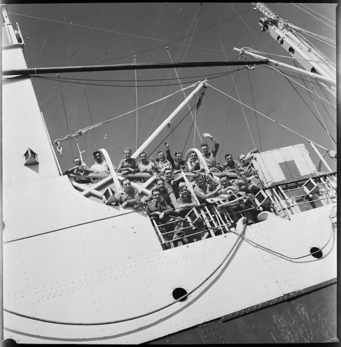 Group of repats line the ship's rail as she comes alongside at Alexandria, World War II - Photograph taken by G R Bull