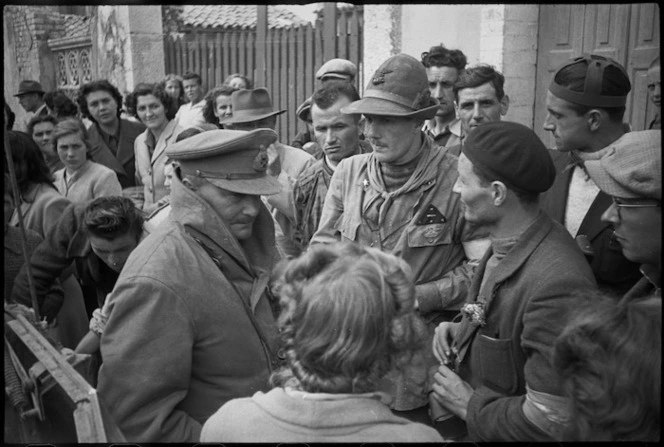 Lieutenant General Sir Bernard Freyberg talking to the leader of a local partisani group, Italy - Photograph taken by George Kaye
