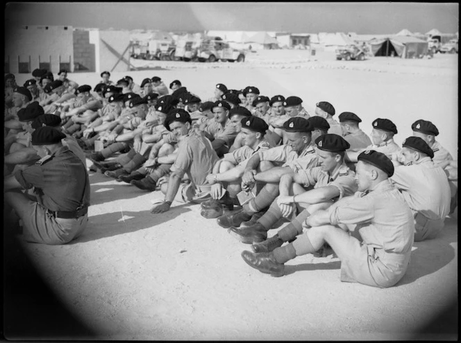 Members of Divisional Cavalry seated during church parade at Maadi Camp, World War II - Photograph taken by G Kaye