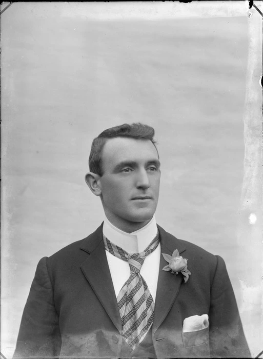 Head-and-shoulders portrait of an unidentified man wearing a standing collar and a striped necktie, possibly Christchurch district