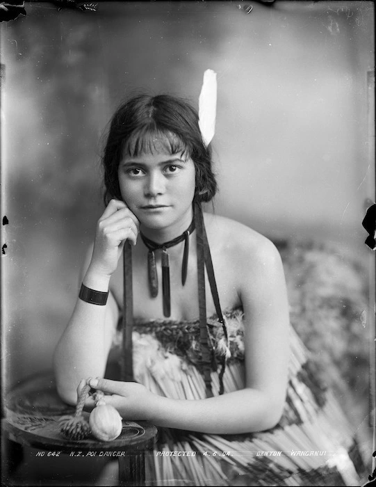 Young Maori woman with poi