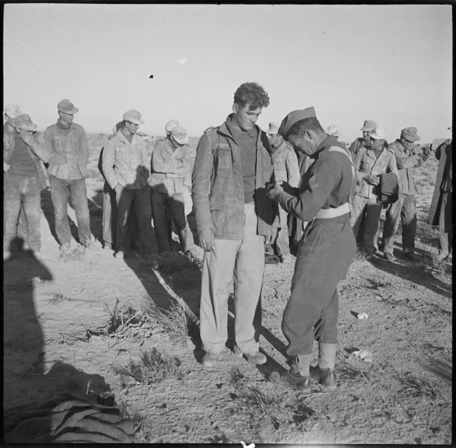 New Zealand troops searching prisoners of war, World War II