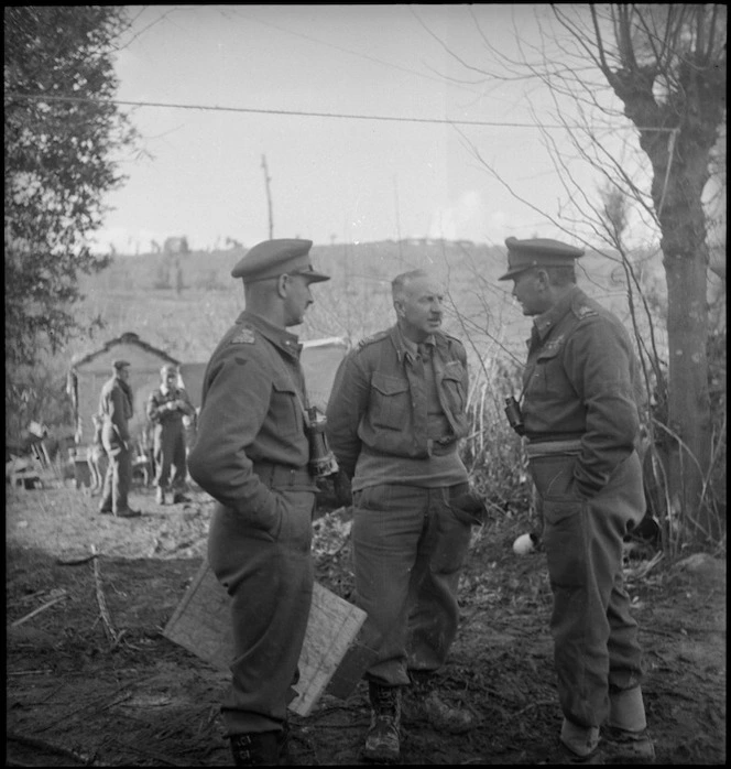 Brigadier Weir, Brigadier Parkinson and General Freyberg confer on Sangro River Front, Italy, World War II - Photograph taken by George Kaye