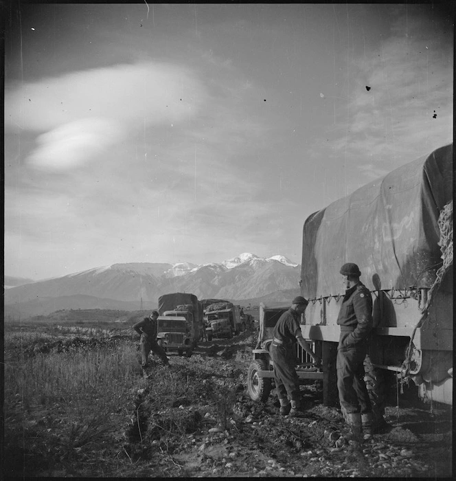 NZ transport on the edge of the Sangro River in Italy, World War II - Photograph taken by George Kaye