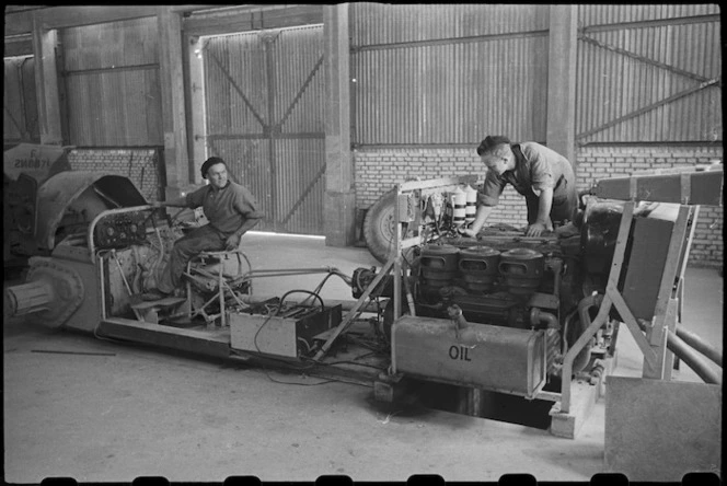 Testing the motors of a Sherman tank chassis used to train tank drivers at NZ Armoured Training School, Maadi, Egypt - Photograph taken by George Bull