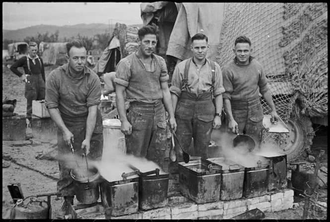Cooks preparing Christmas dinner in the NZ Division area in Italy, World War II - Photograph taken by George Kaye