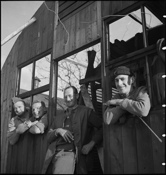 Some of the men building Nissen huts at the New Zealand Advance Base Camp in Italy, World War II - Photograph taken by M D Elias