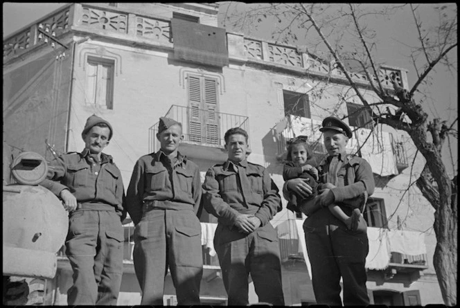 Group of Kiwis outside their billet behind the Italian front line, World War II - Photograph taken by George Kaye