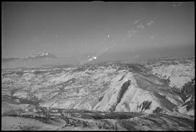 Aerial view of Orsogna showing ridge up which 24 NZ Battalion advanced in early stages of attack, Italy, World War II - Photograph taken by George Kaye