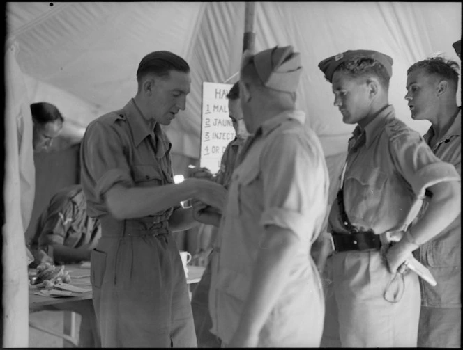 New Zealand soldiers having blood samples taken at a Field Ambulance Unit, Maadi - Photograph taken by G Bull