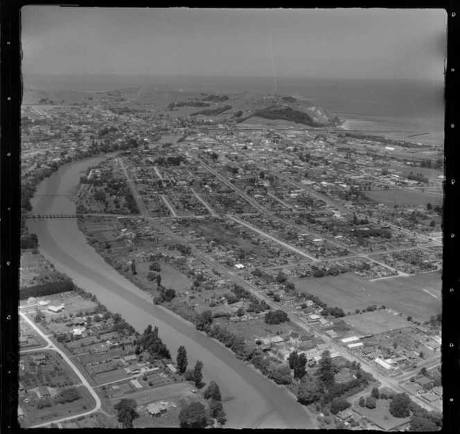 Gisborne, Poverty Bay, showing Taruheru River and housing, looking out towards the Harbour