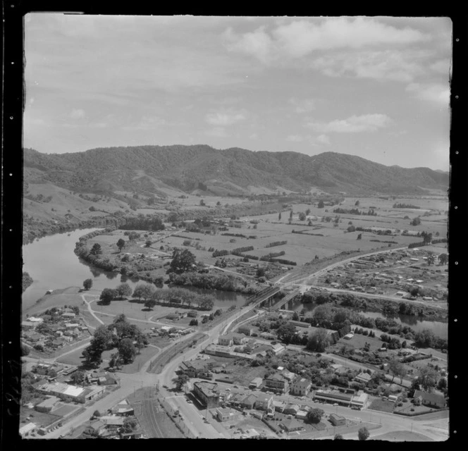 Ngaruawahia road and rail bridges under construction over the Waikato River, with the Great South Road through town, Waikato Region