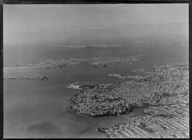 Auckland City and Harbour with Westhaven Marina Harbour Bridge construction site, to Devonport and Rangitoto Island beyond
