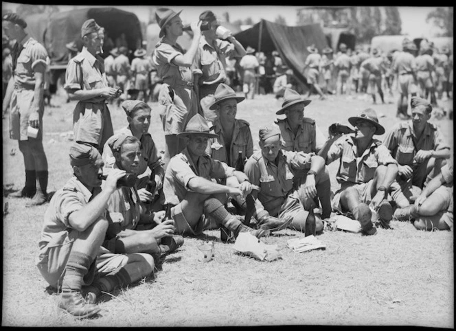 Spectators enjoying lunch at NZ Division Athletics Championships in Cairo, Egypt, World War II - Photograph taken by George Kaye