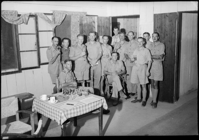 Officers of the Dental Mess, Maadi, toasting Lt W G Hill on the eve of his marriage to Sister L A Fletcher - Photograph taken by George Bull