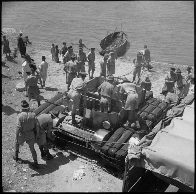 NZ Engineers experiment with amphibious bren carrier ready with floats attached and lashed on, Nile River at Maadi, Egypt - Photograph taken by George Bull