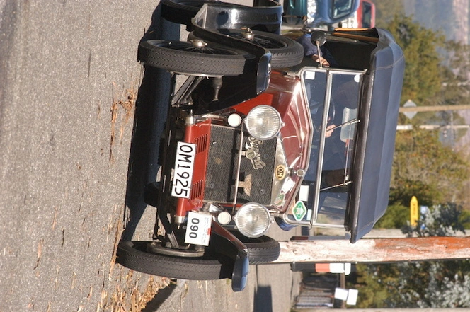 Photographs relating to vintage cars and motorcycles