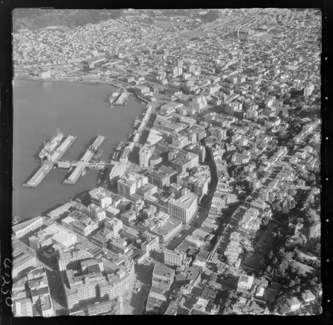 Wellington City with Lambton Quay and The Terrace roads from bottom right, with Waterloo Quay and Customhouse Quay wharf area to Te Aro Flats beyond