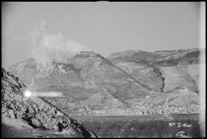 Thick clouds of smoke and dust from bombing obscures Benedictine Monastery at Cassino, Italy, World War II - Photograph taken by George Kaye