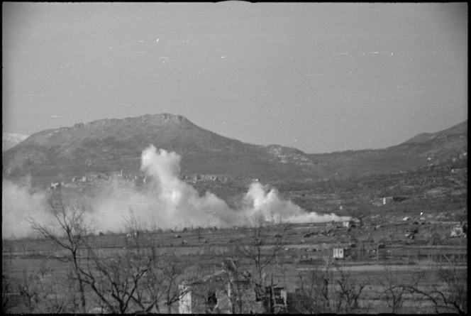 Enemy shelling and counter smoke screen in the vicinity of San Pietro, Italy, World War II - Photograph taken by George Kaye