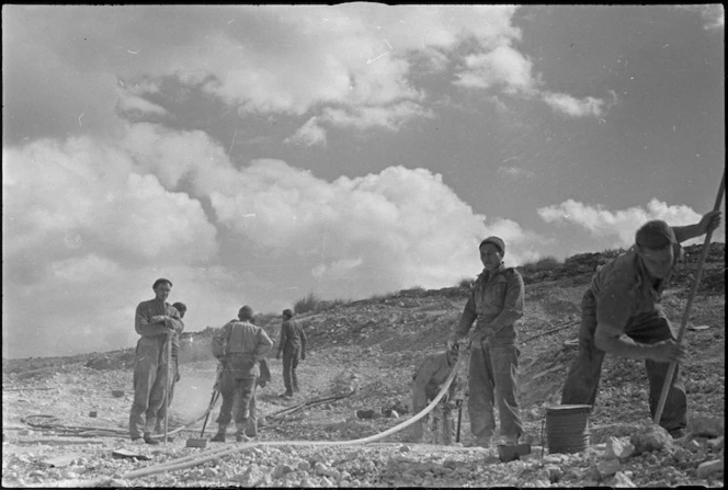 New Zealand Engineers quarrying metal for roads in the Monte Cassino area, Italy, World War II - Photograph taken by George Kaye