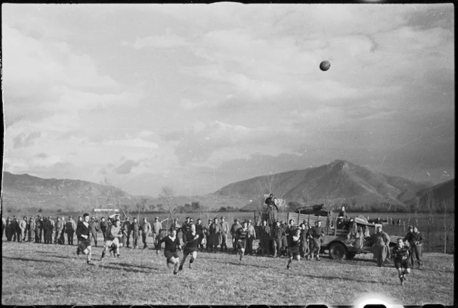 Spectators watching play in rugby match in the Cassino area, Italy, World War II - Photograph taken by George Kaye