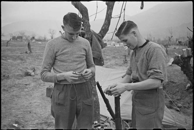 D A Robertson and D Davies, of NZ Infantry, rest behind the lines on the Cassino Front, Italy, World War II - Photograph taken by George Kaye