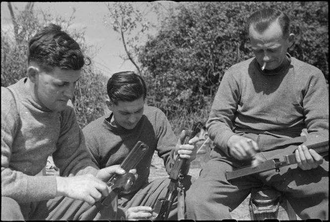 Three NZ Infantry soldiers resting behind the line on the Cassino Front, Italy, World War II - Photograph taken by George Kaye