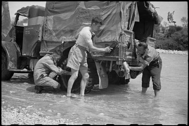 New Zealanders wash their truck in the Volturno River, Italy, World War II - Photograph taken by George Bull