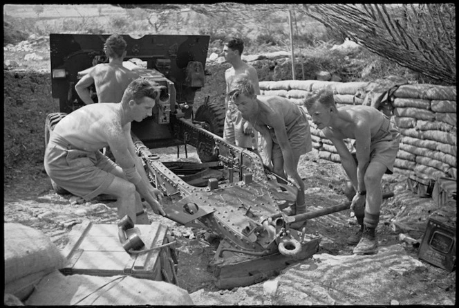 NZ Divisional Artillery gunners moving their gun in the Cassino area, Italy, World War II - Photograph taken by George Kaye