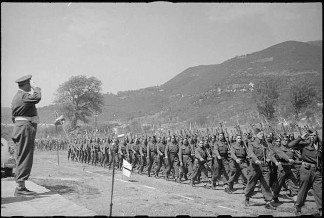 General Freyberg taking the salute during march past of 5 NZ Infantry Brigade in the Volturno Valley, Italy, World War II - Photograph taken by George Kaye