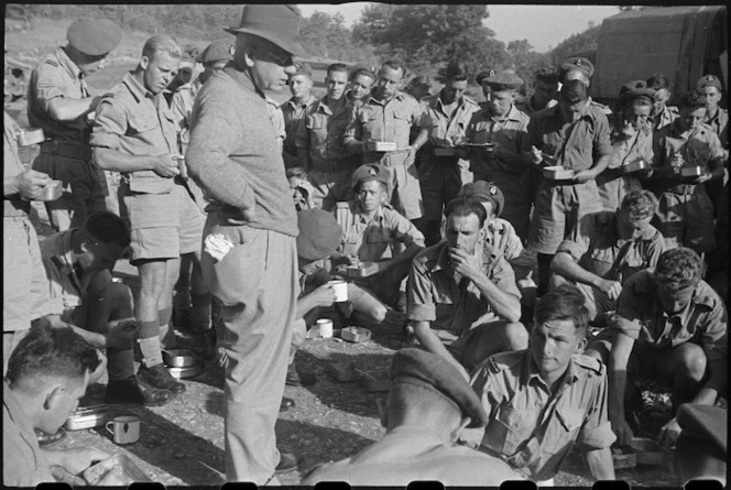 NZ Prime Minister Peter Fraser addressing 6 NZ Field Ambulance personnel in Volturno Valley area, Italy, World War II - Photograph taken by George Bull