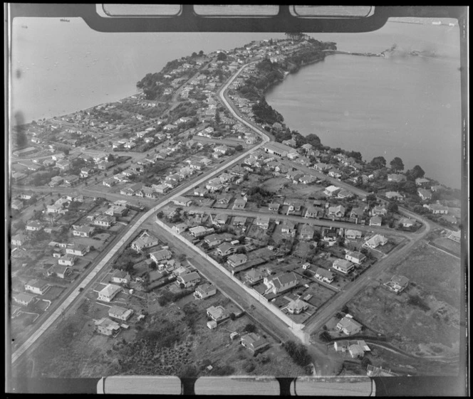 Northcote Point with Queen Street in foreground with residential housing,looking to the Ferry Terminal and Little Shoal Bay, Auckland City