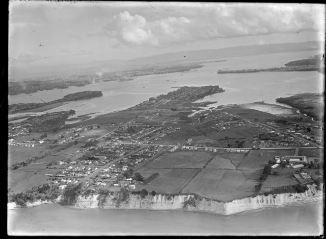 View of Belmont and Bayswater residential housing area with Lake Road and Bayswater Avenue, looking to Northcote Point and Auckland City