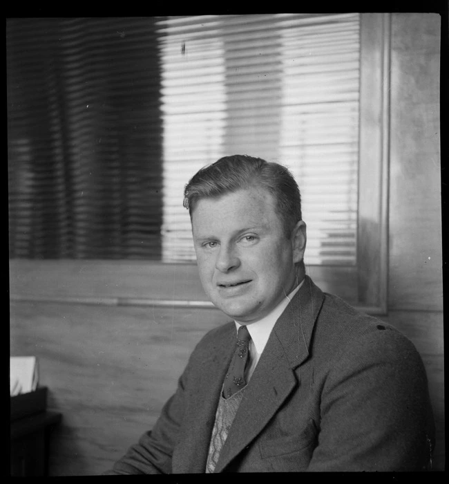 Portrait of Mr J W Reid, Instructor at [Vilson?] Aero Club, Whites Aviation Office, Auckland City