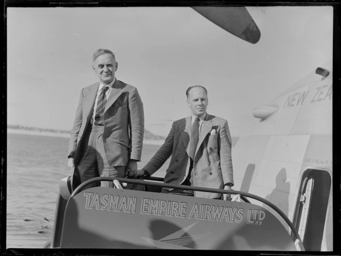 Sir John Buchanan and Mr W Hambrook, boarding a Tasman Empire Airways Limited aircraft