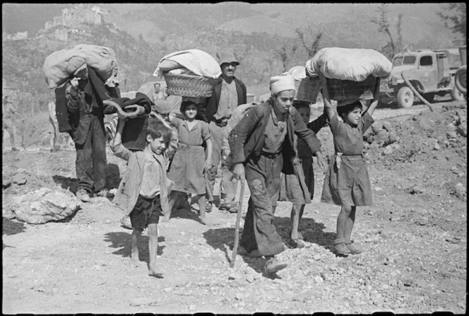 Refugees return to their homes as NZ Division advances in the Atina area, Italy, World War II - Photograph taken by George Kaye