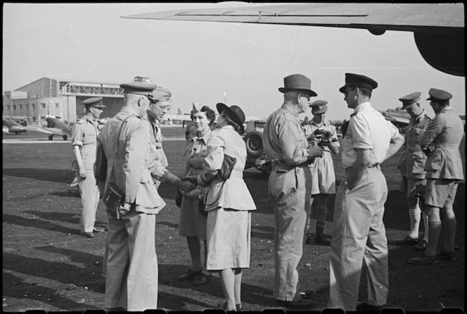 Prime Minister Peter Fraser with farewell party at Bari Airport, Italy, World War II - Photograph taken by George Bull