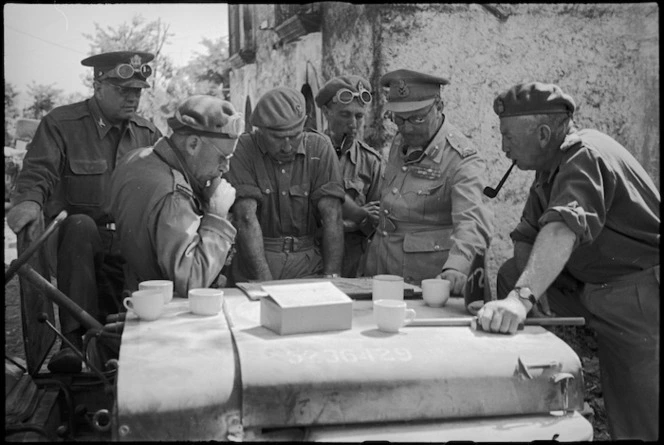 General Freyberg and staff confer at 5 NZ Infantry Brigade HQ in Sora area, Italy, World War II - Photograph taken by George Kaye