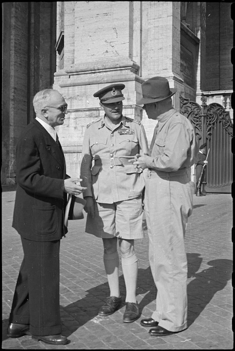 Prime Minister Peter Fraser and General Bernard Freyberg met by Vatican official, Italy, World War II - Photograph taken by George Bull