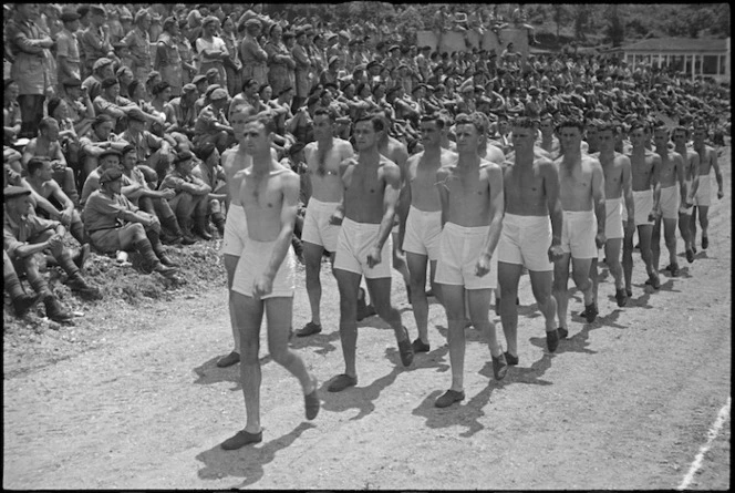 Parade of competitors at 4 NZ Armoured Brigade Sports held at Isola del Liri, Italy, World War II - Photograph taken by George Kaye