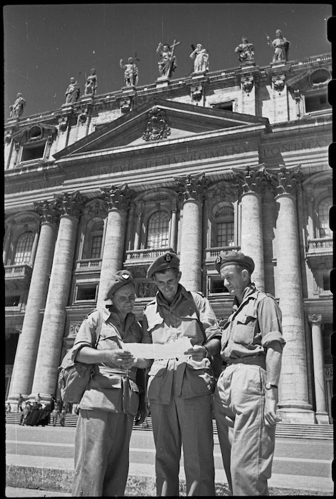 World War II New Zealand soldiers on leave in Rome, Italy, stand with plan in front of St Peter's Basilica - Photograph taken by George Kaye