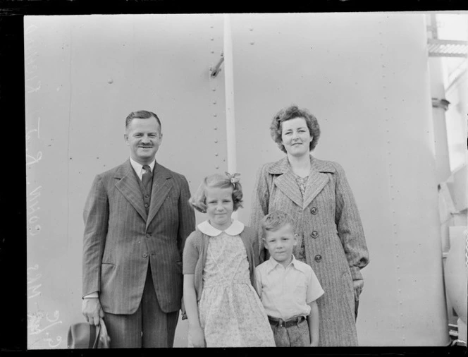 Group Captain Cohen and Mrs Cohen with their children on board the ship Rakaia
