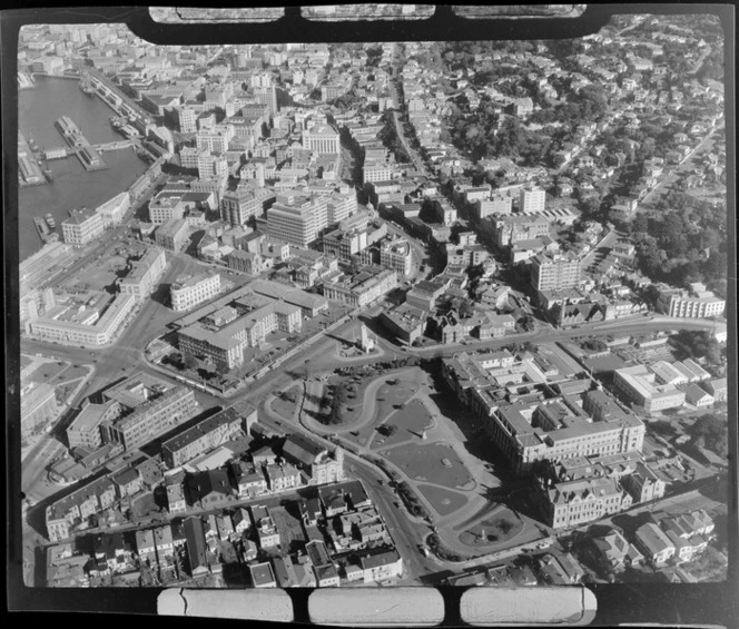 View of Parliament Buildings in foreground with the Old Government Buildings on Lambton Quay and the central business district beyond, Wellington City